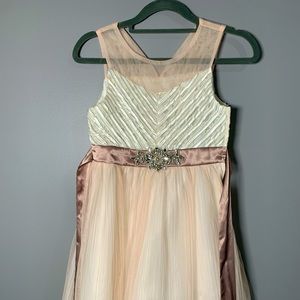 Girls Rare Editions size 12 in a beautiful light peach color.